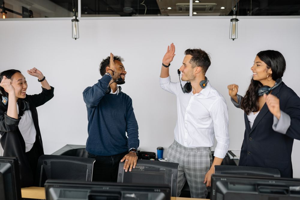 Team celebrating in the office